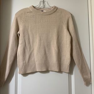 cream-colored sweater